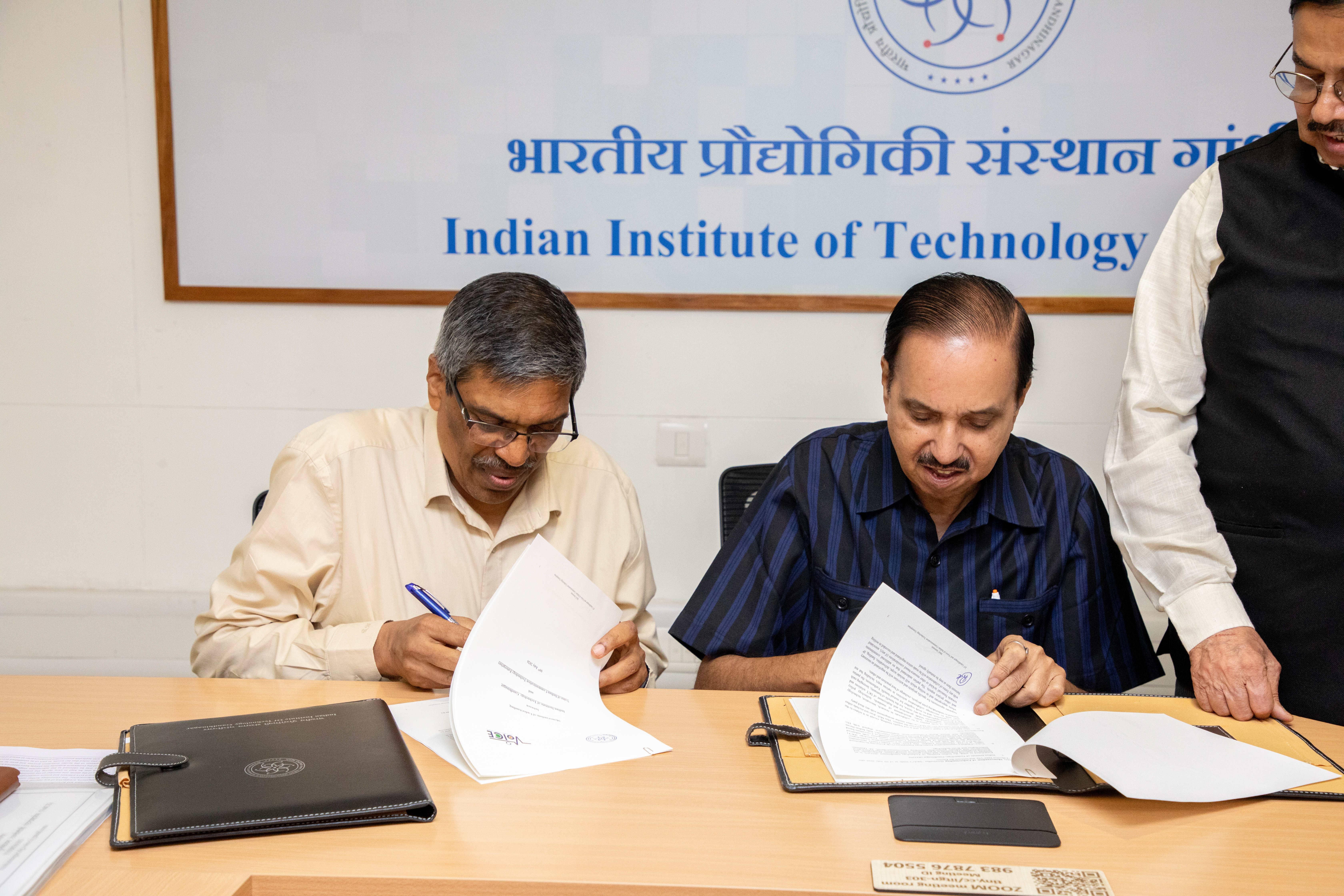 MoU being signed by Prof. Rajat Moona, Director, Indian Institute of Technology and Rakesh Kumar Bhatnagar, Director General, VoICE